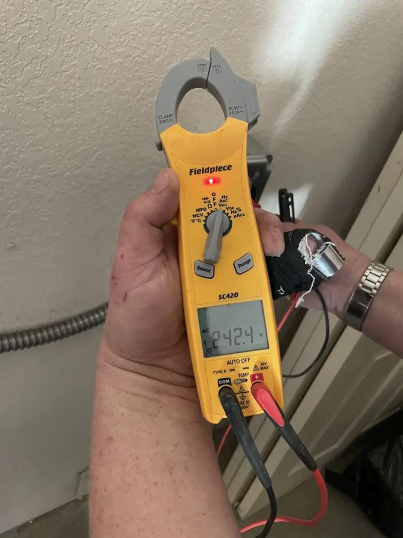 Voltage testing with clamp meter during Generator Installation in Hoquiam